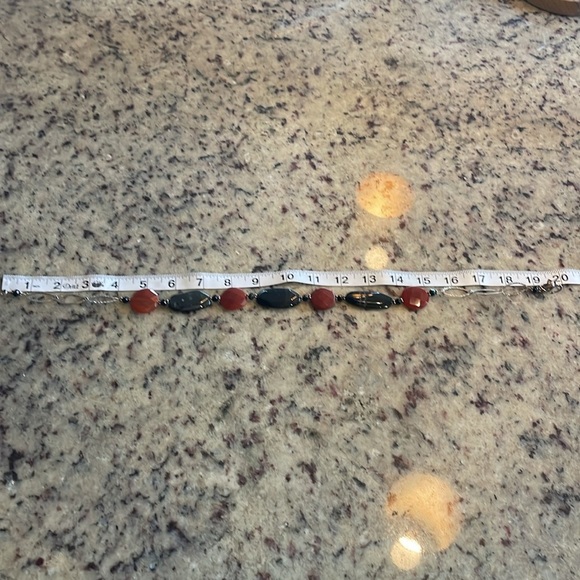Crystal Coffin Black Onyx and Red Carnelian Necklace  Black onyx and carnelian .925 necklace with rose clasp